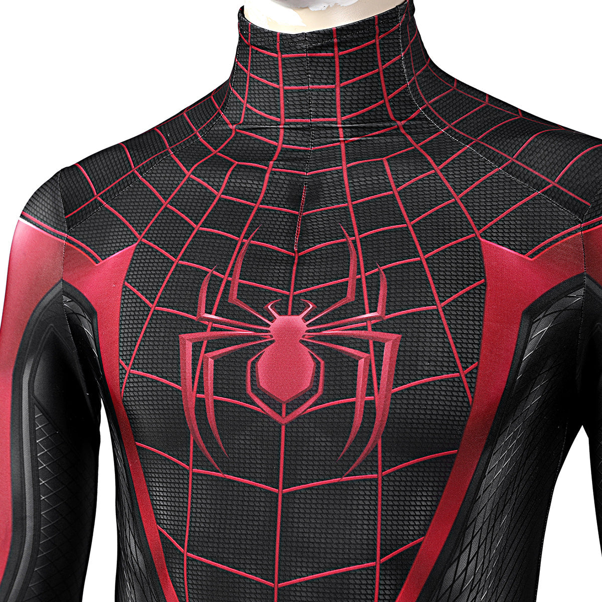 Miles Morales suit chest close-up showing the red spider emblem, web pattern and high collar