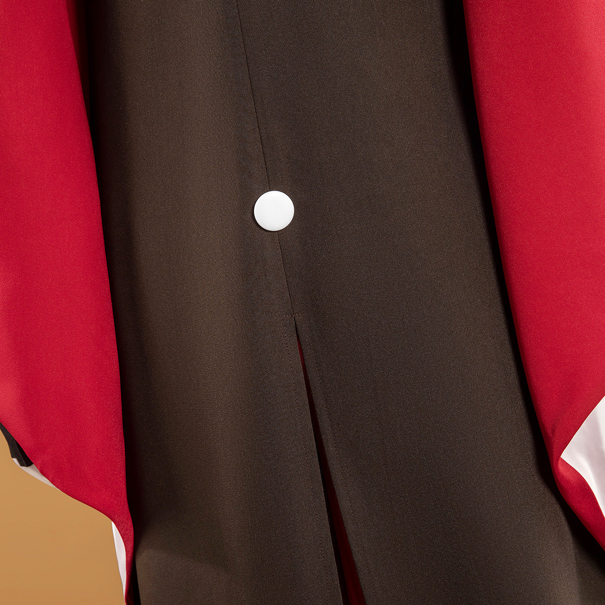 Close-up of the Mai costume back showing the round white button above the center slit