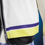 Riku white vest hem detail showing purple and yellow bands, stitching and the front zipper