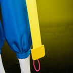 Close-up of the Jubilee yellow strap end beside the gathered blue trouser cuff and pink cord loop