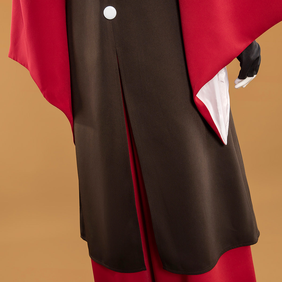 Mai costume rear detail showing the split dark outer layer and white lining inside the red sleeve