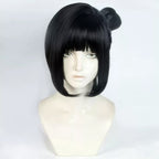 Front view of the Inako Momokawa black wig with blunt bangs, curved face-framing sections and a raised side bun