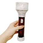 Upright view of the Feng Min flashlight cosplay prop showing the white switch detail and ringed white end cap