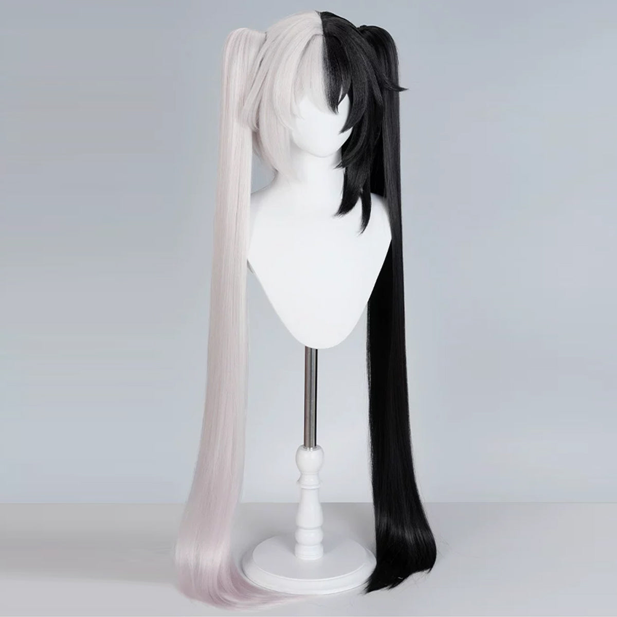 Opposite angled view of the Sparxie wig showing white face-framing strands and curved twin-tail ends