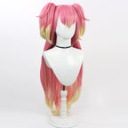 Angled front view of the Inukai Komugi wig showing pointed pink bangs, yellow ends and long flowing back sections