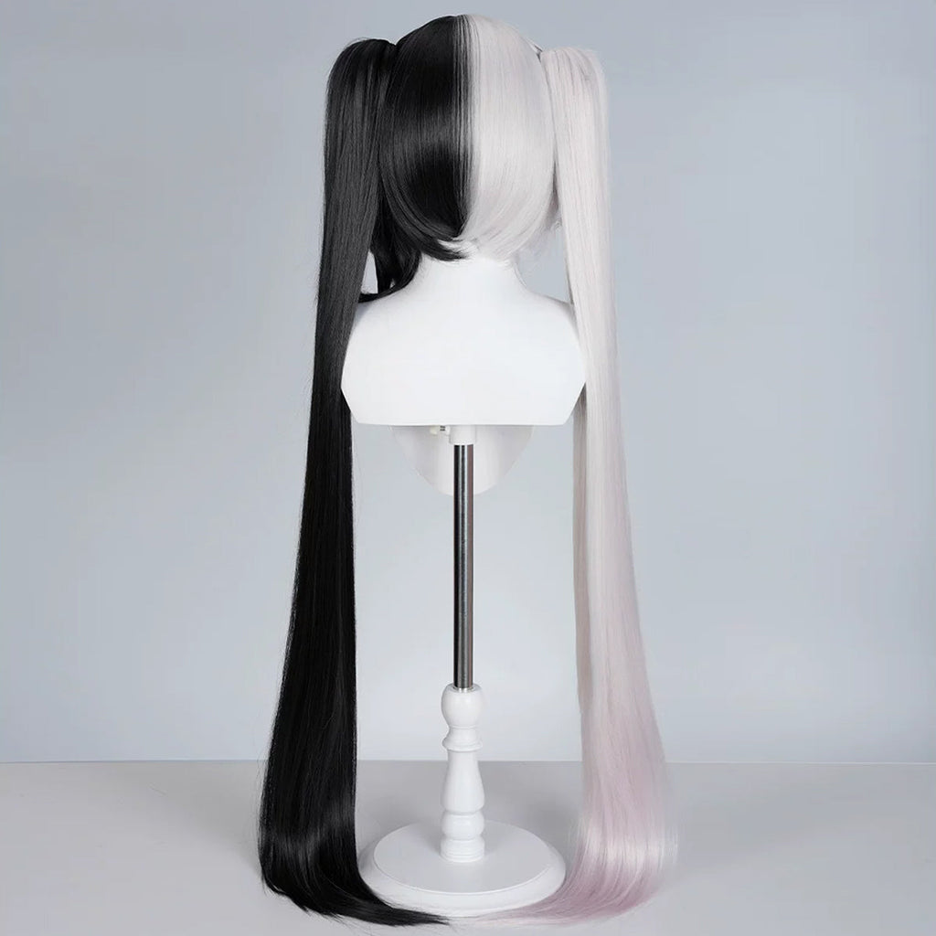 Back view of the Sparxie black-and-white wig showing the split-color short base and long twin tails