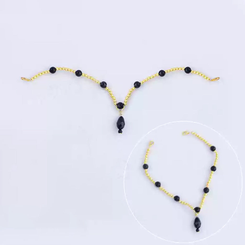 Fiona Gilman Crimson Priestess forehead chain with gold-tone links, black beads and a teardrop pendant