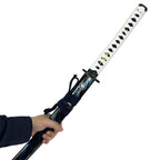 Hand holding the sheathed Jin Sakai long sword cosplay prop, showing its white-wrapped handle and dark cord
