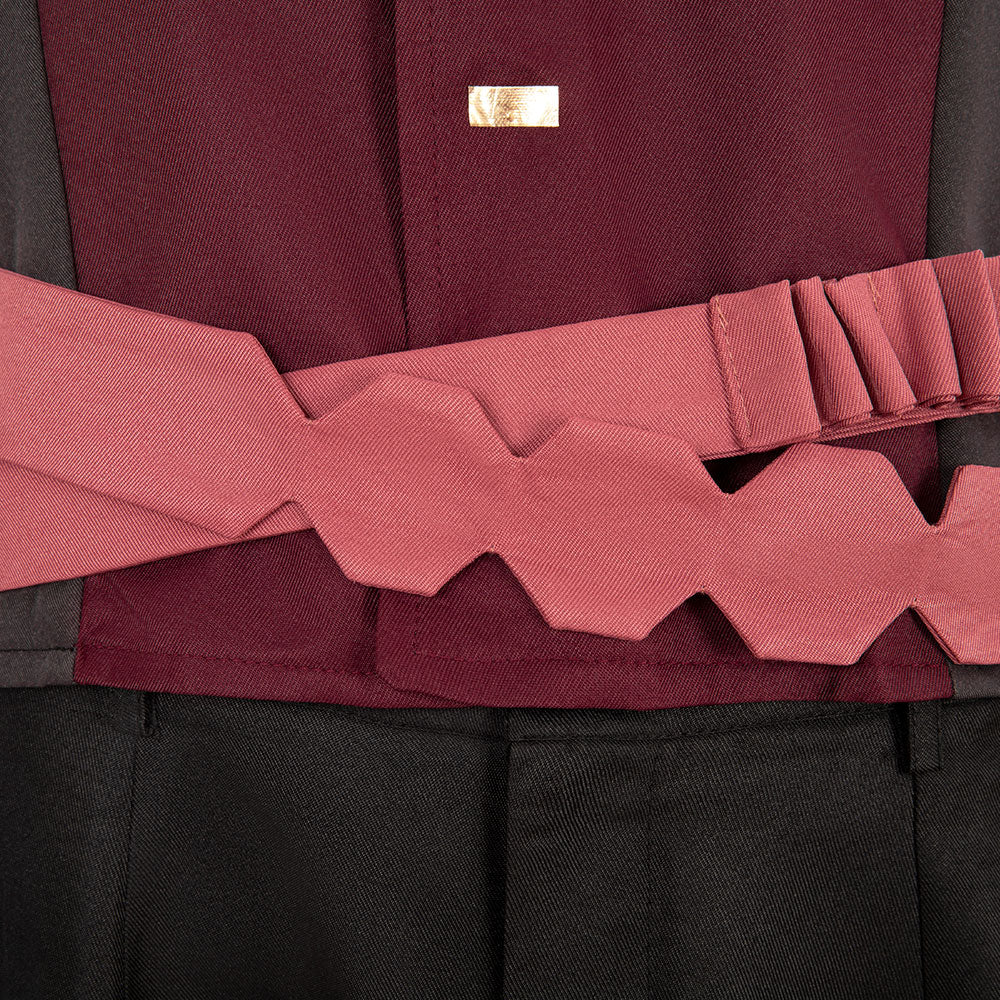 Close-up of the Falco pink waist straps showing the angular front panel and rows of fabric loops