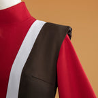 Close-up of the Mai costume shoulder seam where the dark outer layer meets the red sleeve and white trim