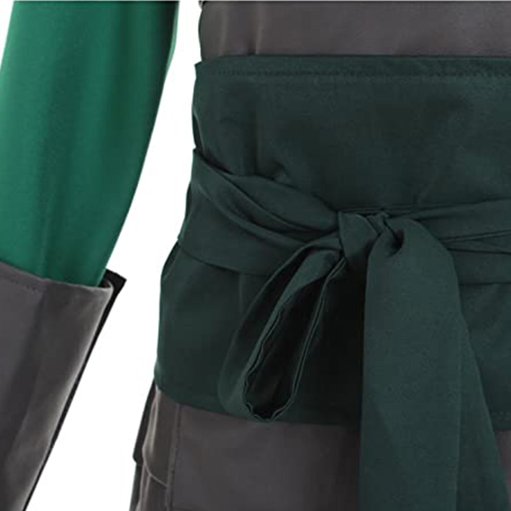 Close-up of the Suki dark green waist sash tied over the segmented armor-style panels