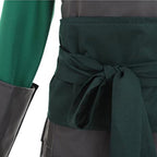 Close-up of the Suki dark green waist sash tied over the segmented armor-style panels