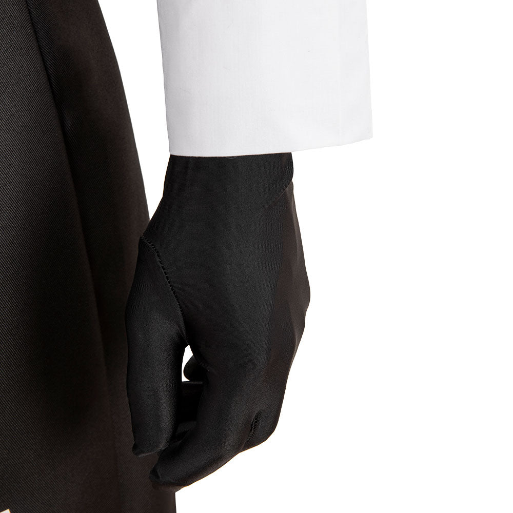 Close-up of the Falco black glove beneath the white shirt sleeve