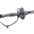 Close-up of the Lady Maria sword handle showing scroll patterns, lattice detail and curved hand guard