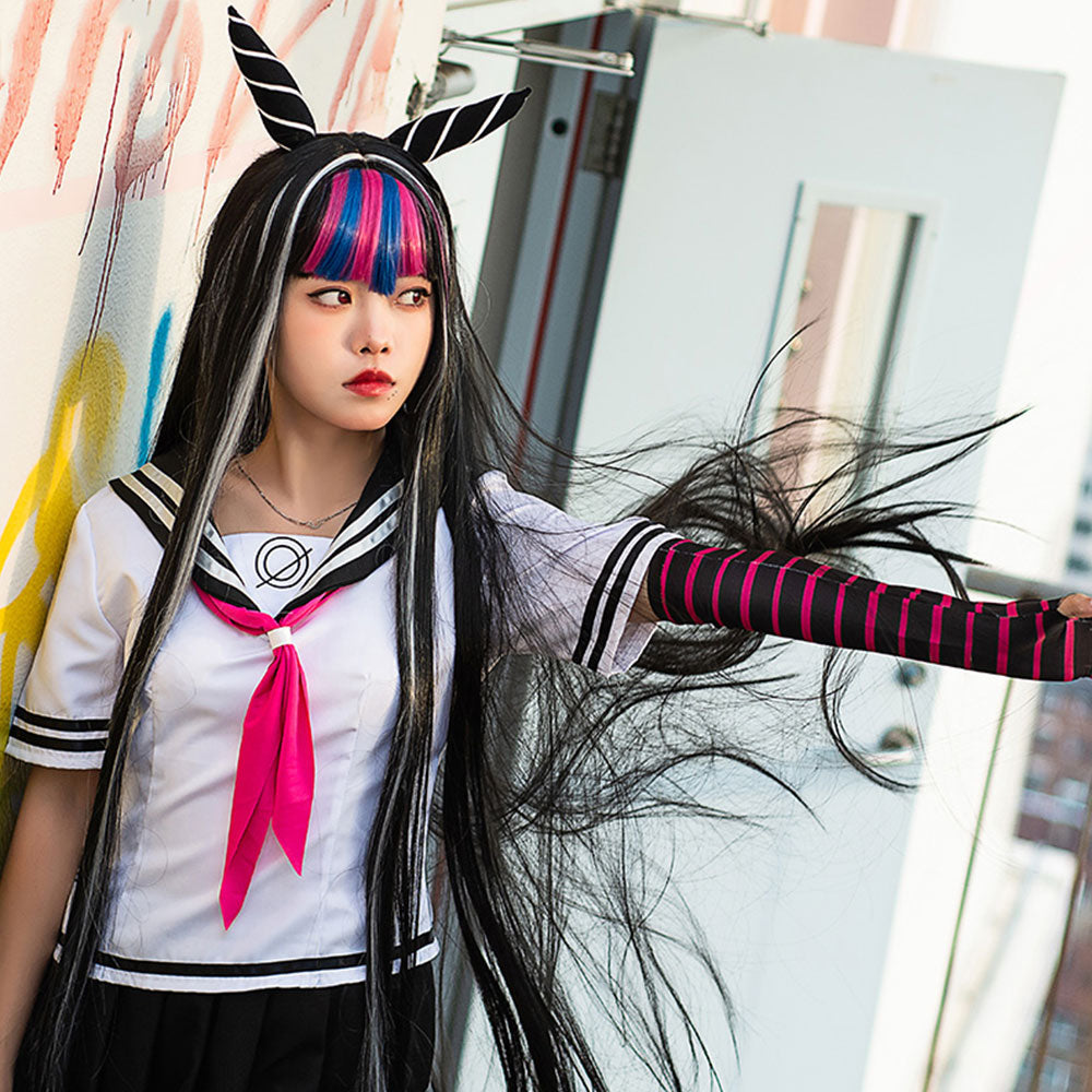 Upper-body view of the Ibuki Mioda costume showing the sailor collar, pink necktie and outstretched striped arm warmer